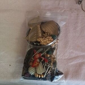 Mixed Vintage Jewelry Lot with Gold-Tone Shell Brooch and Colorful Charms